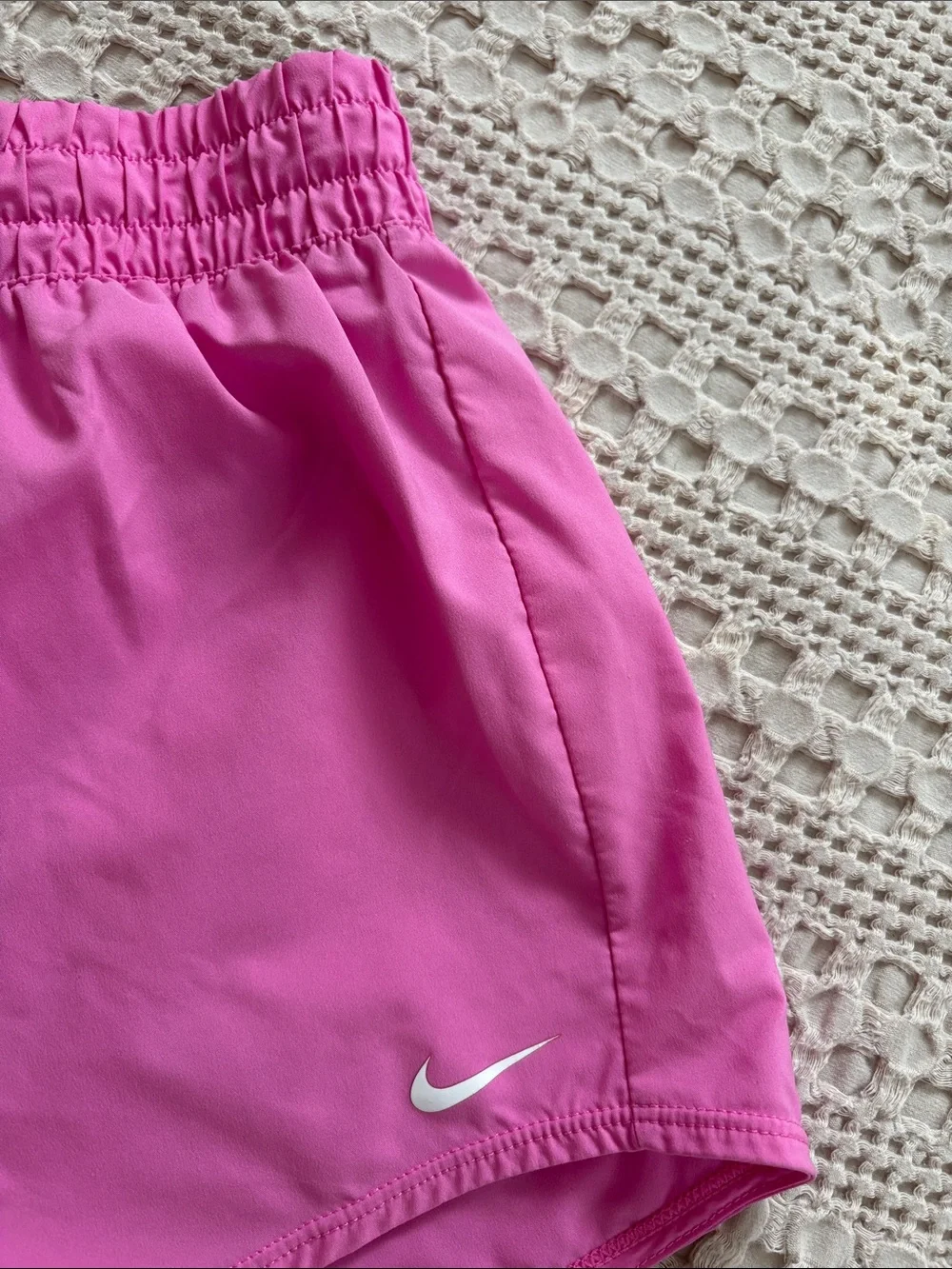 Nike Girl’s Pink Athletic Shorts with White Swoosh